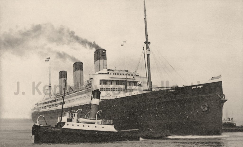 A photograph of the White Star liner Majestic with a tug alongside.